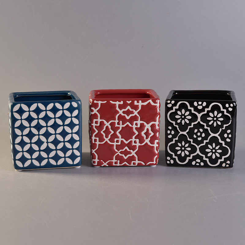 black square ceramic candle holder with white flower pattern