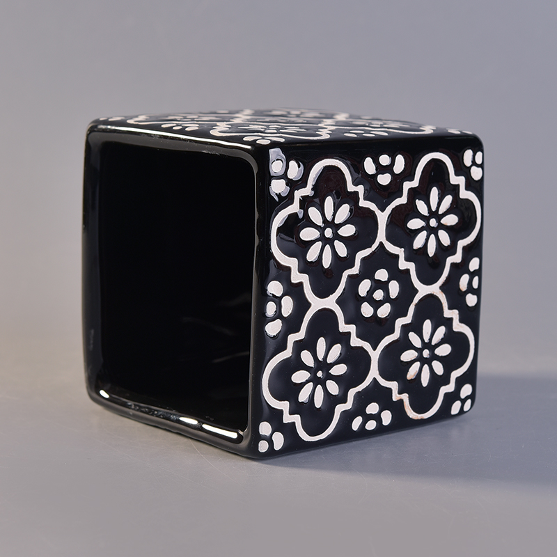 black square ceramic candle holder with white flower pattern