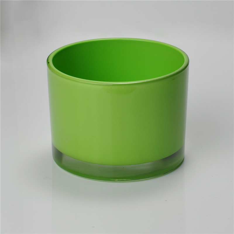 Green round straight-sided glass candle holder