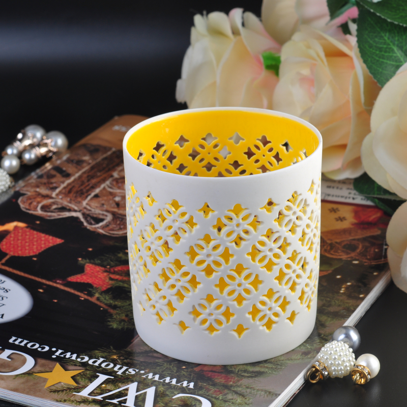 White hollow-out ceramic candle holder vessel flower pattern yellow inner 