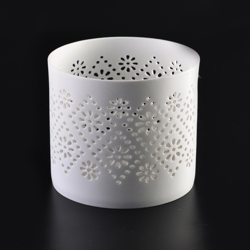 White hollow-out ceramic candle holder