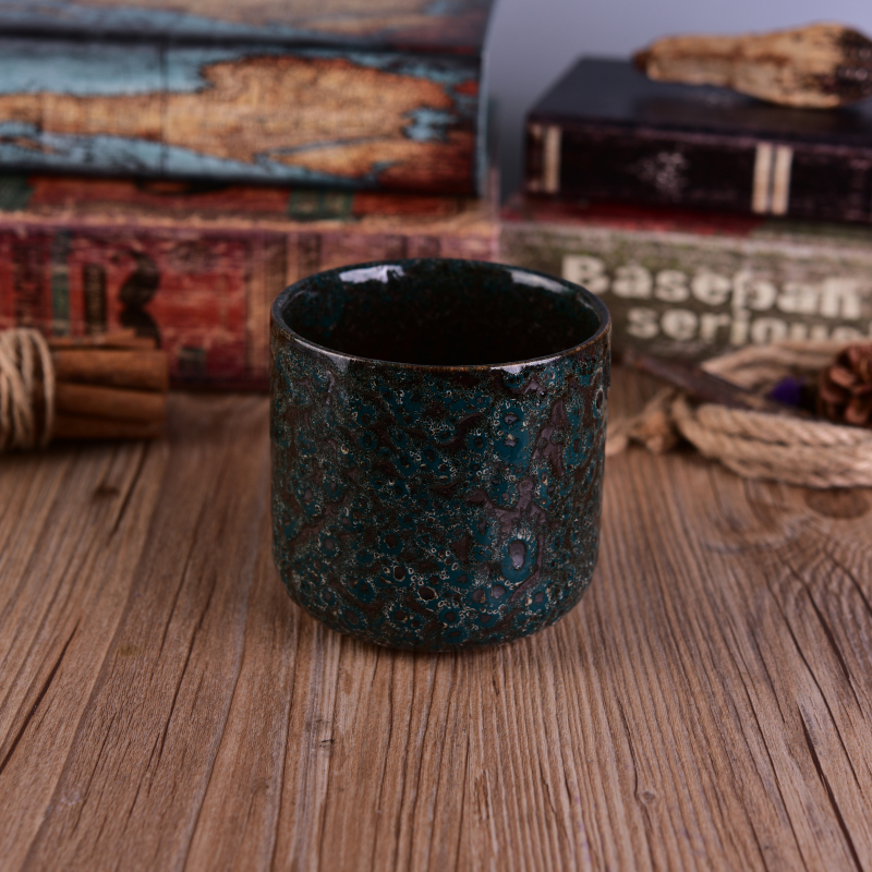 Black ceramic candle vessel with relief surface