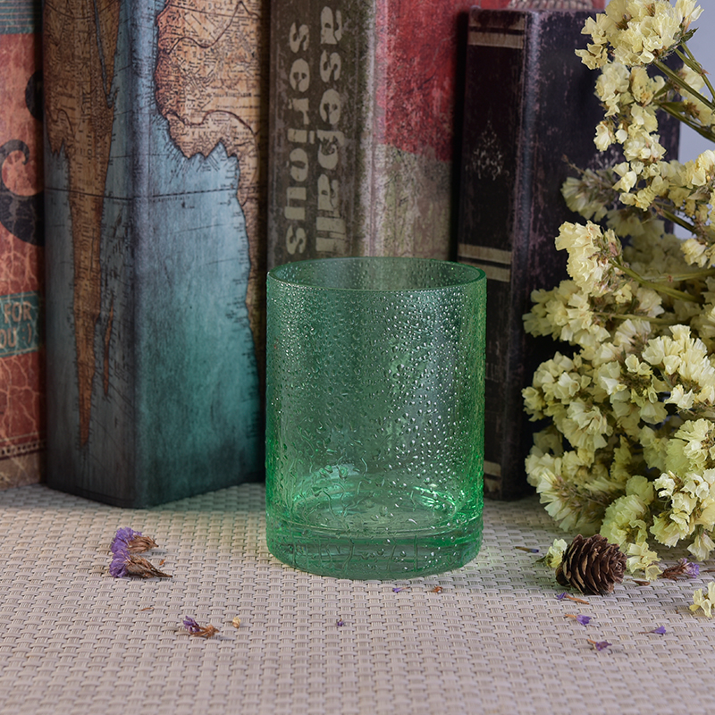 Green round straight-sided glass candle holder with rain drops effect