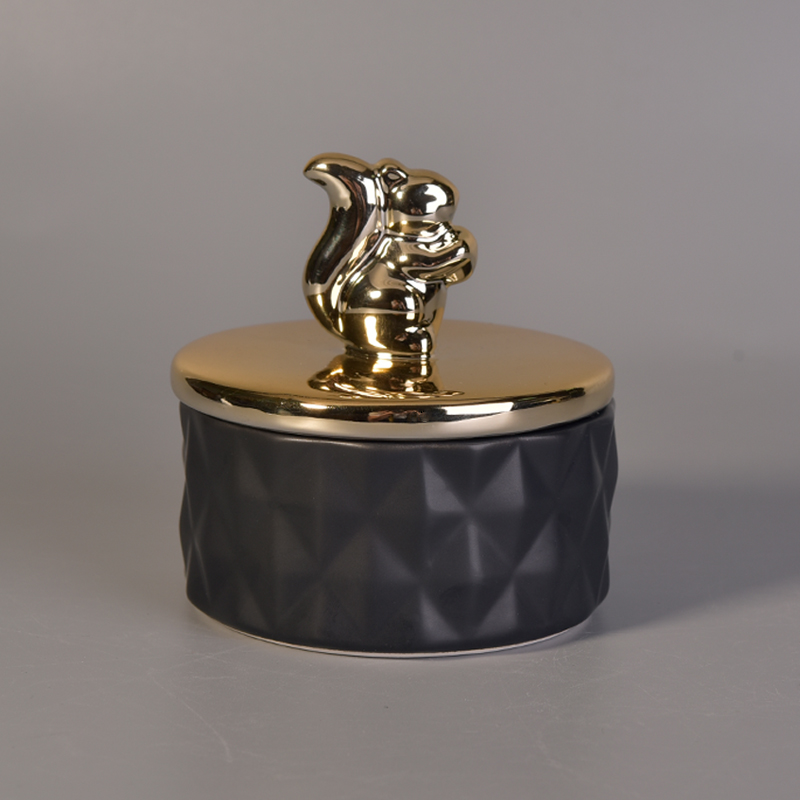 matte black ceramic candle jar with glossy squirrel lid