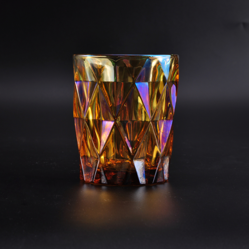 Iridescent glass candle holder with diamond-shaped pattern surface