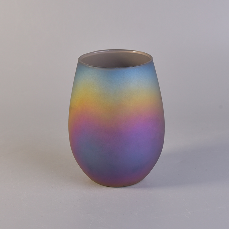 Oval iridescent glass candle vessel