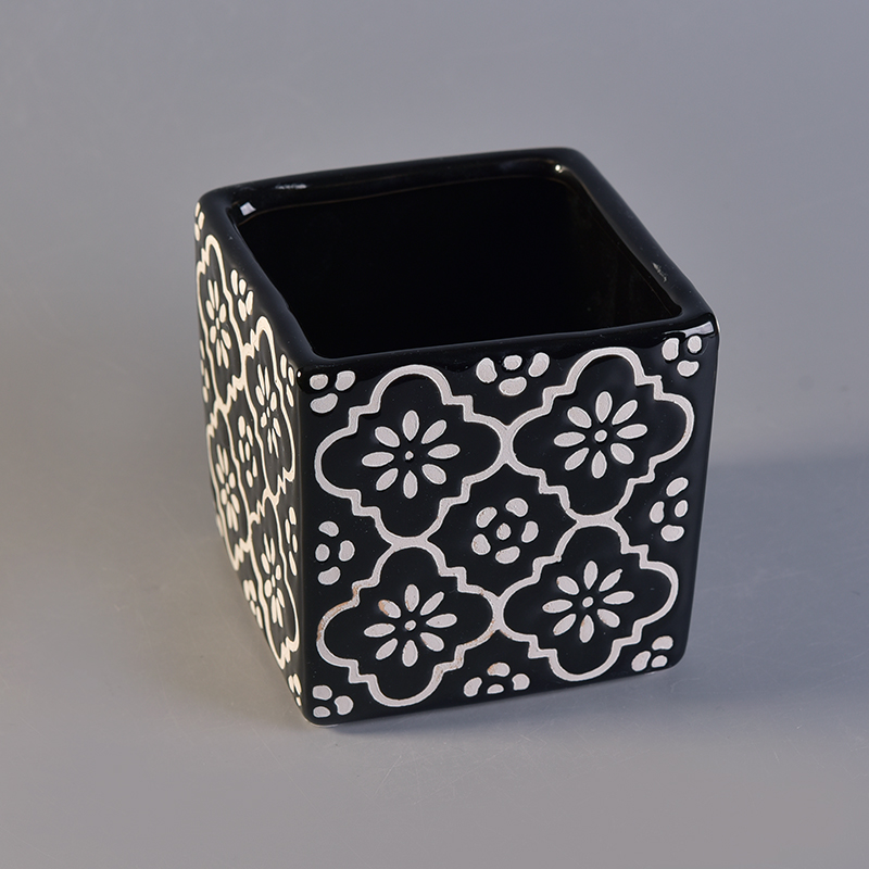 black square ceramic candle holder with white flower pattern