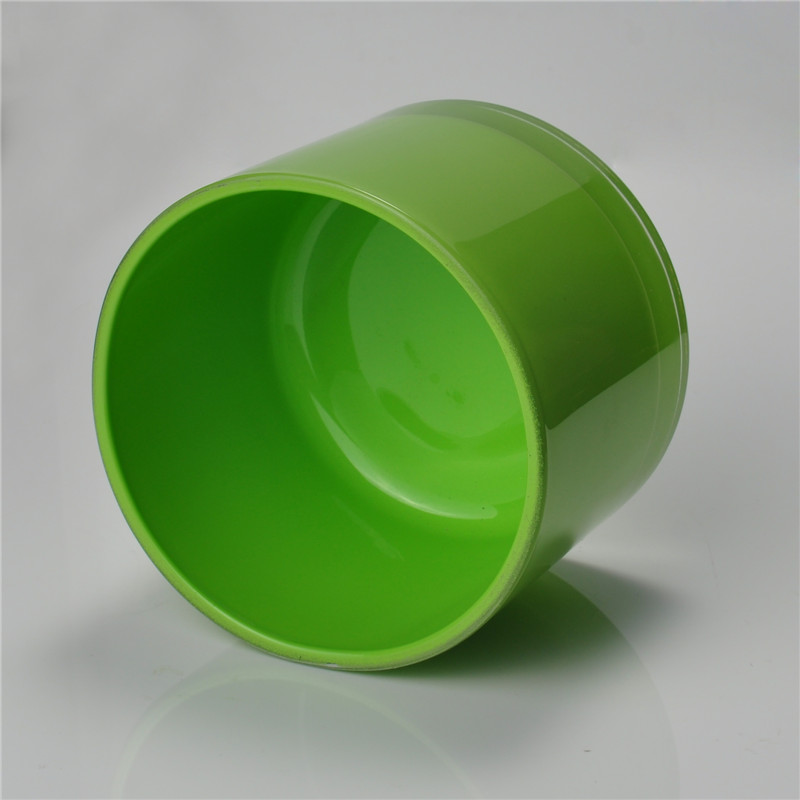 Green round straight-sided glass candle holder