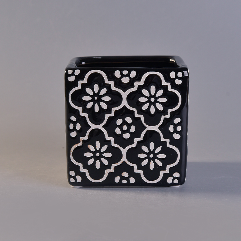 black square ceramic candle holder with white flower pattern