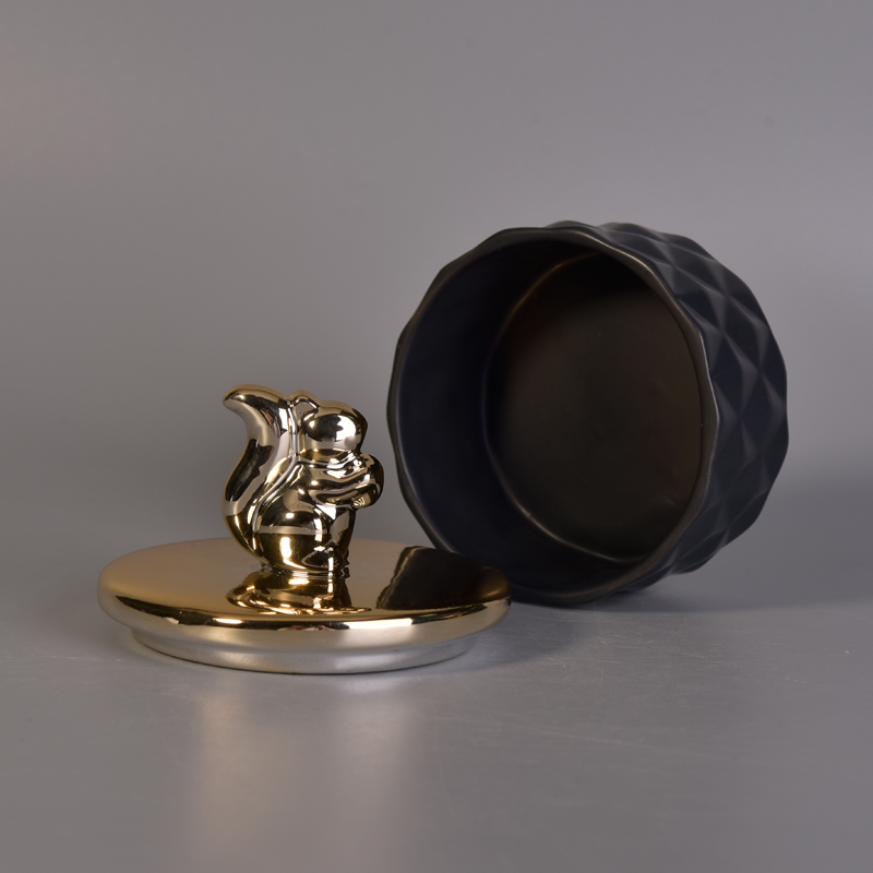 matte black ceramic candle jar with glossy squirrel lid