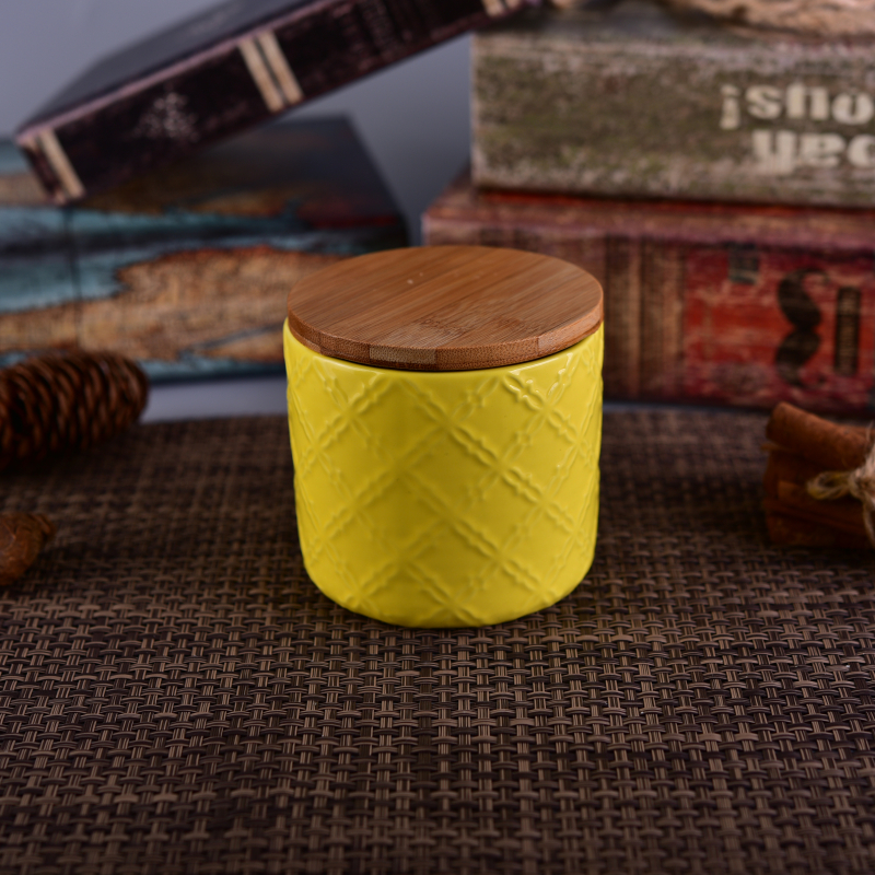 matte yellow embossed ceramic candle jar with wooden lid