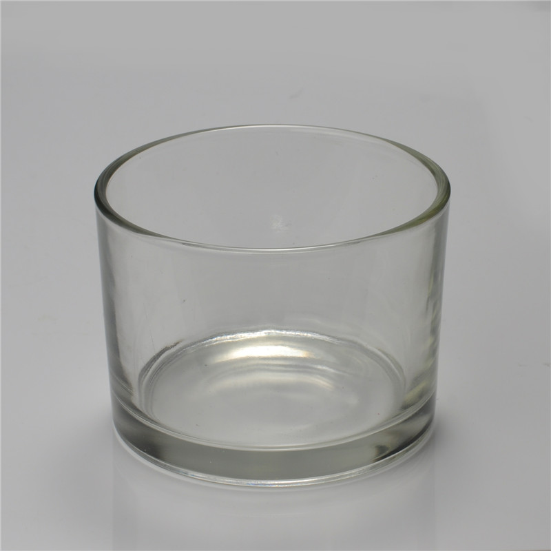 Green round straight-sided glass candle holder