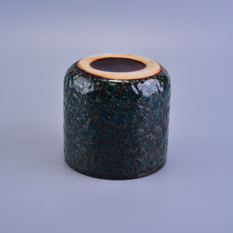 Black ceramic candle vessel with relief surface