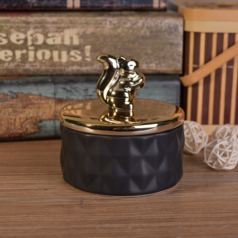 matte black ceramic candle jar with glossy squirrel lid