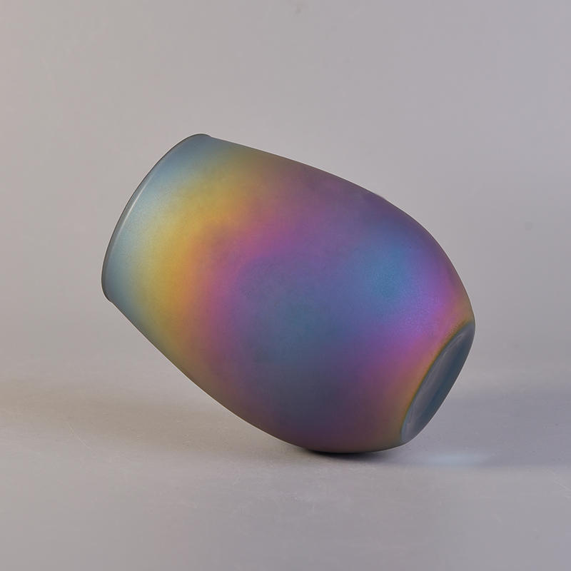 Oval iridescent glass candle vessel