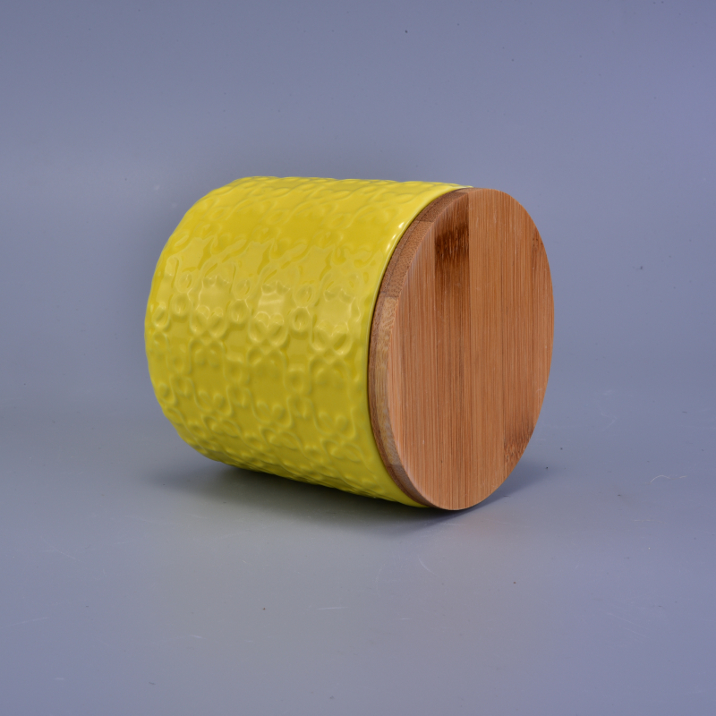 matte yellow embossed ceramic candle jar with wooden lid