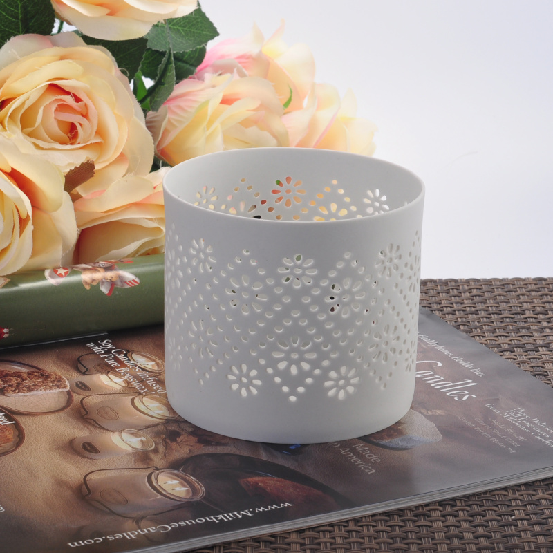 White hollow-out ceramic candle holder