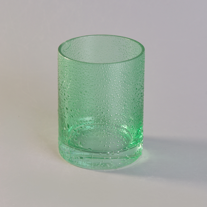 Green round straight-sided glass candle holder with rain drops effect