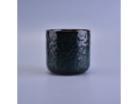 Black ceramic candle vessel with erose surface