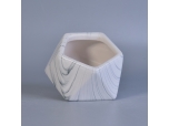 Geometrical shape ceramic container with marble pattern