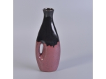 black and pink ceramic oval diffuser bottle