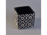 black square ceramic candle holder with white flower pattern