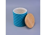 blue ceramic candle holder with wooden lid