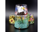 glass candle vessel with sea grass painting