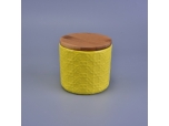 matte yellow embossed ceramic candle jar with wooden lid