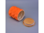 orange matte ceramic candle holder with wooden lid